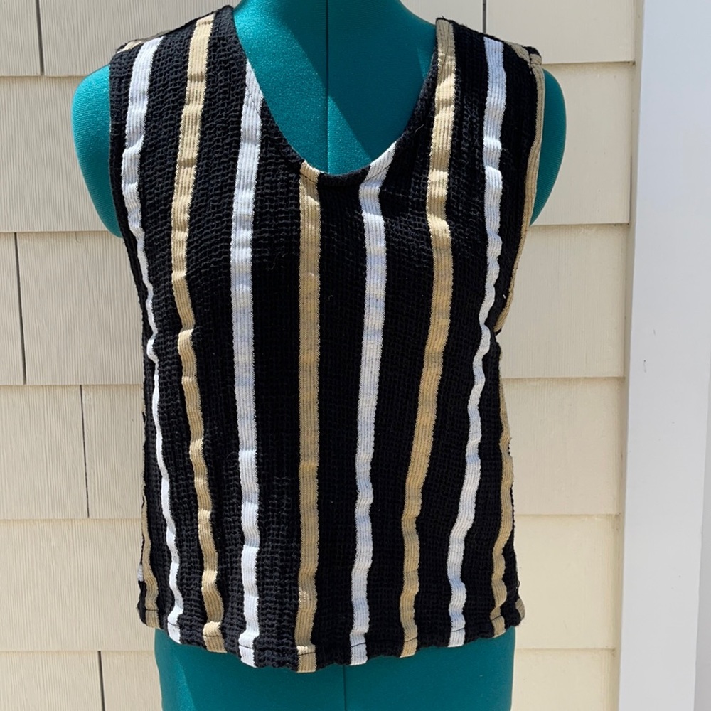 Ace & Jig Hot Cross Tank Archive.